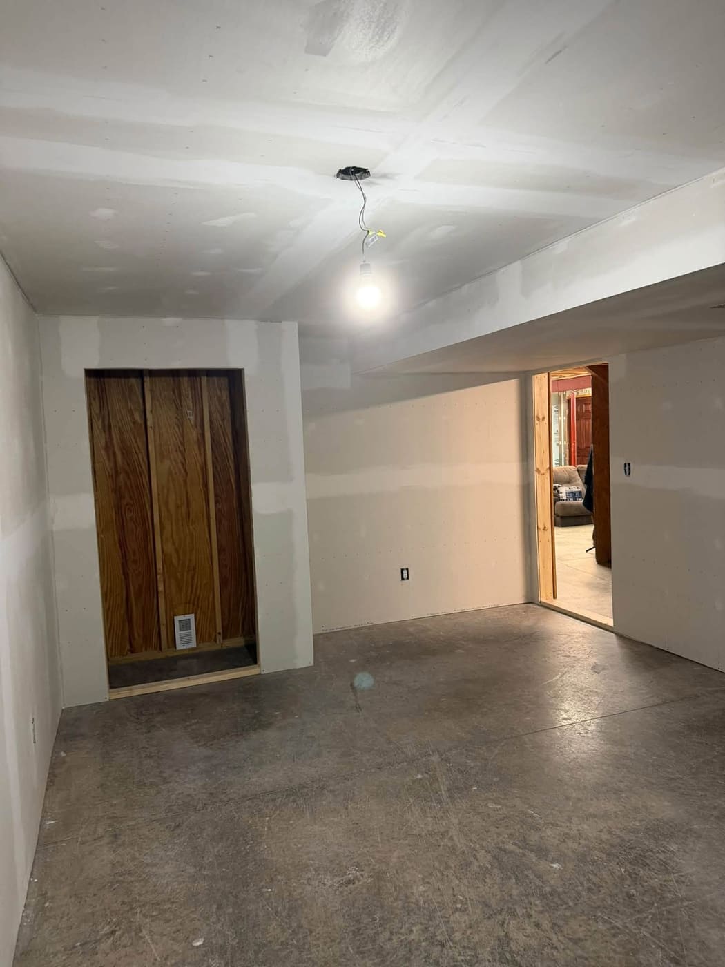 New basement bedroom framed and drywalled