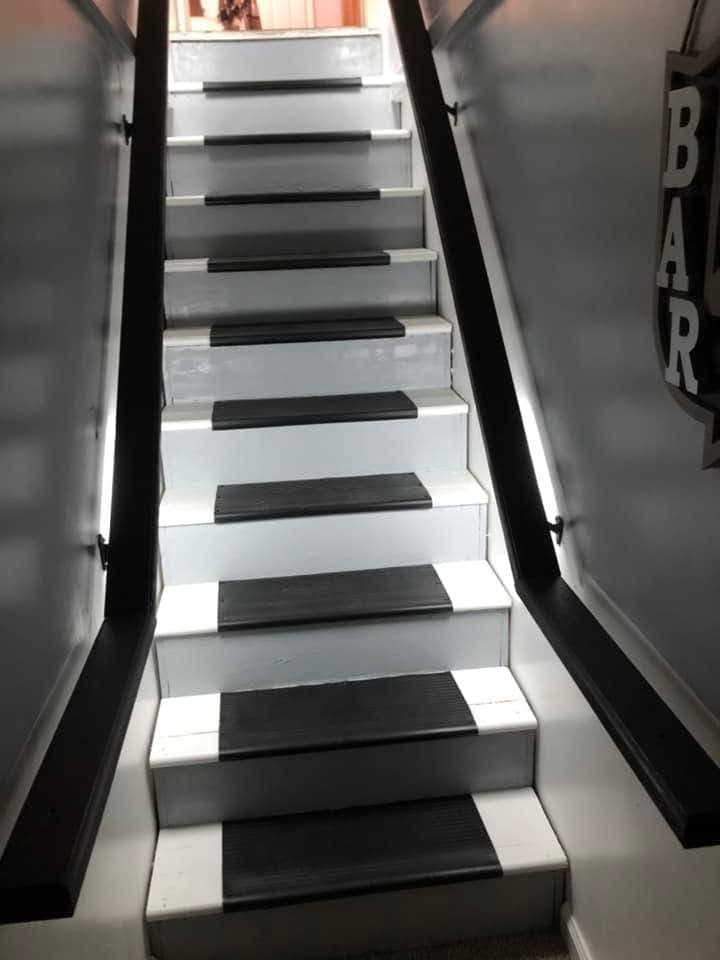 Basement steps refinished in black and white