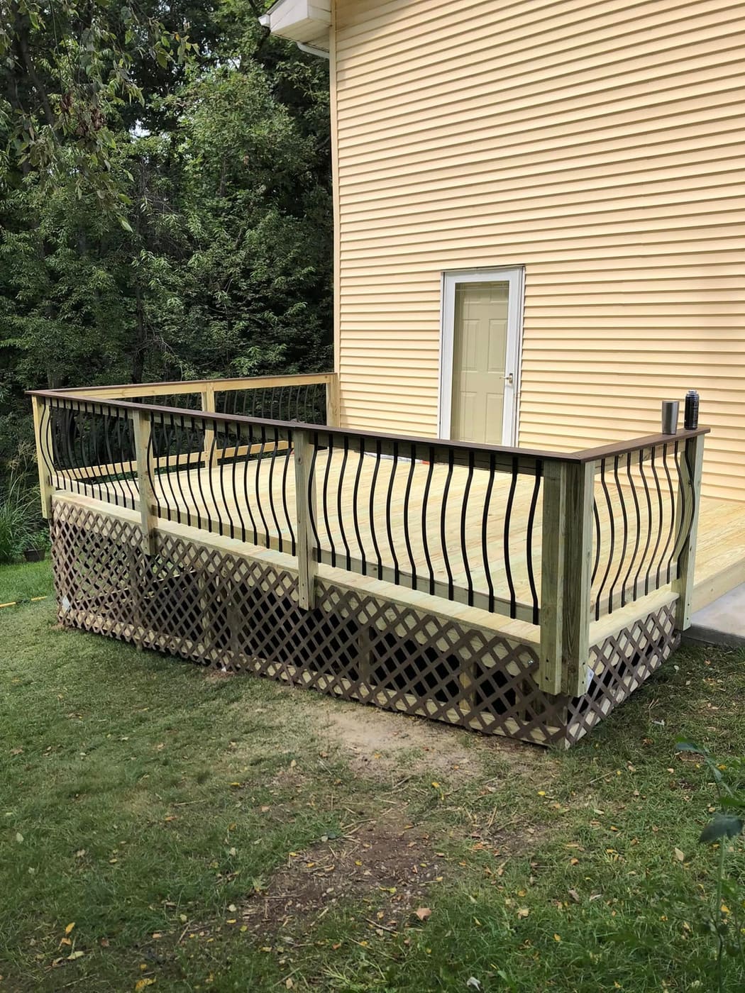 Deck with curved black balusters, view 3