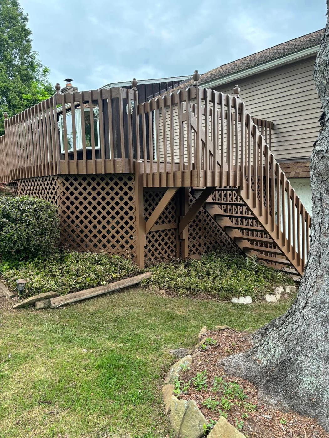 Painted deck with stairs and lattice