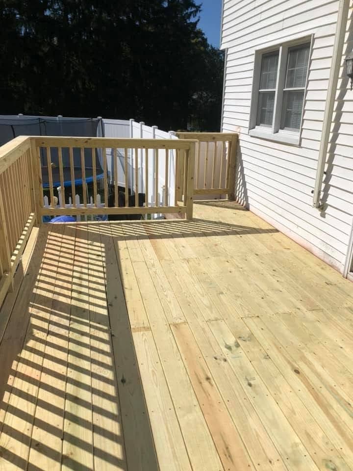 Rebuilt deck with new railing, view 4