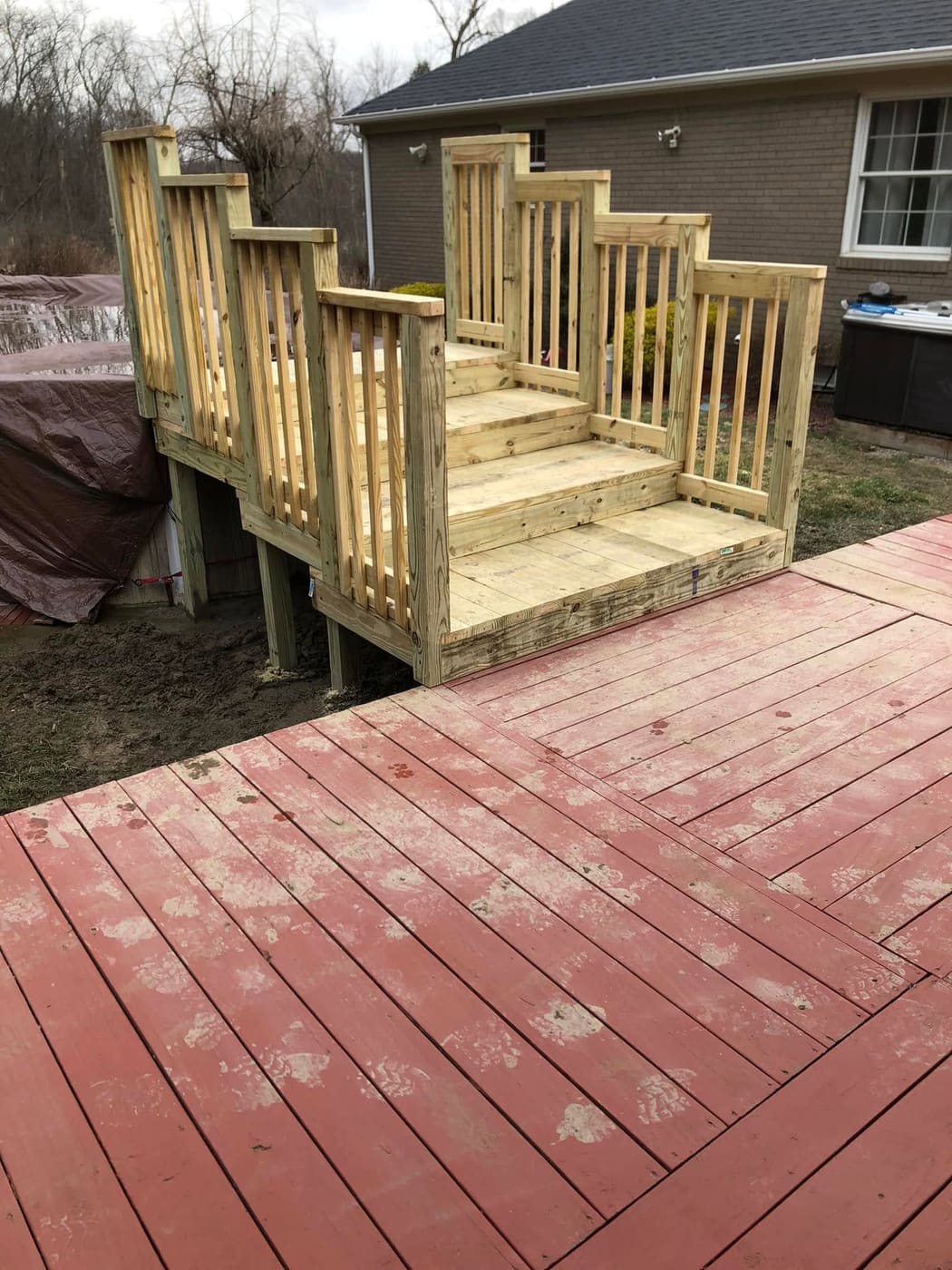 New pressure-treated deck steps