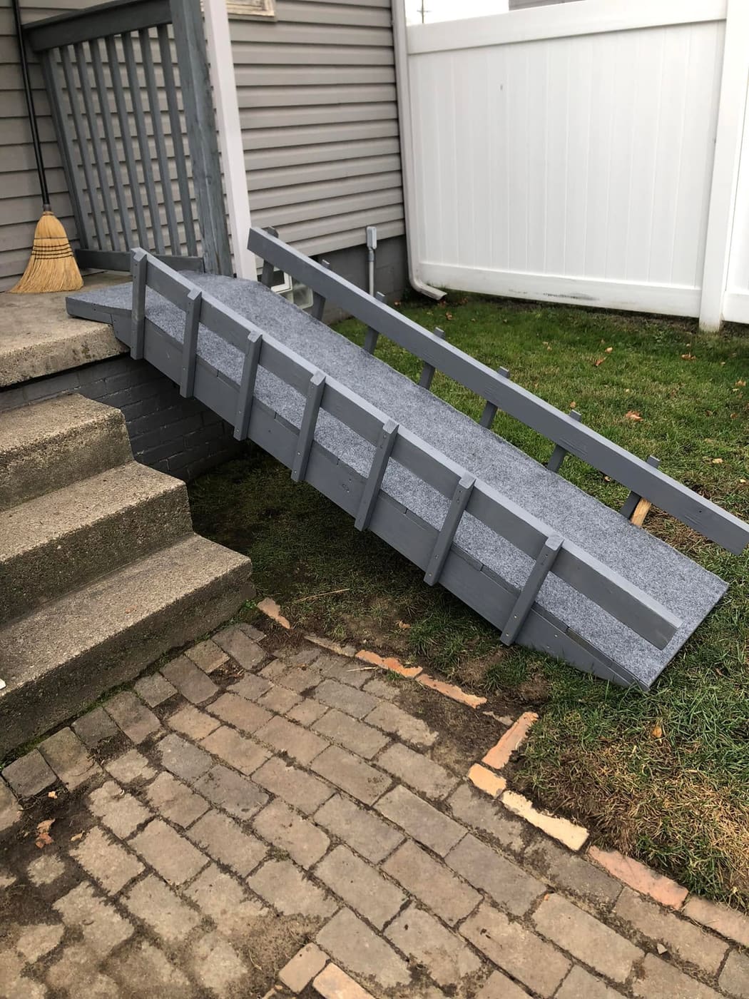 Wood dog ramp over outdoor steps