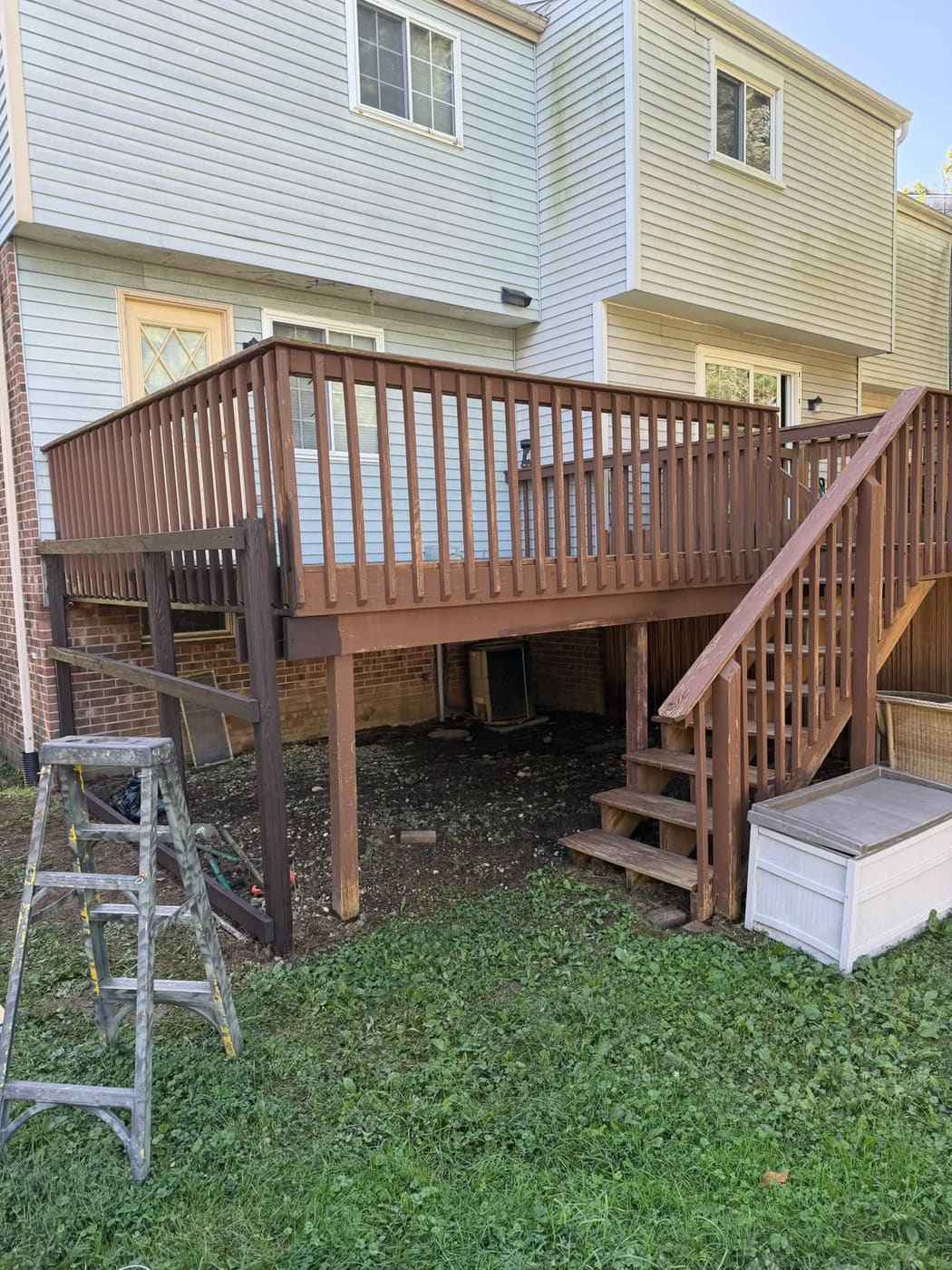 Elevated deck and stairs stained brown