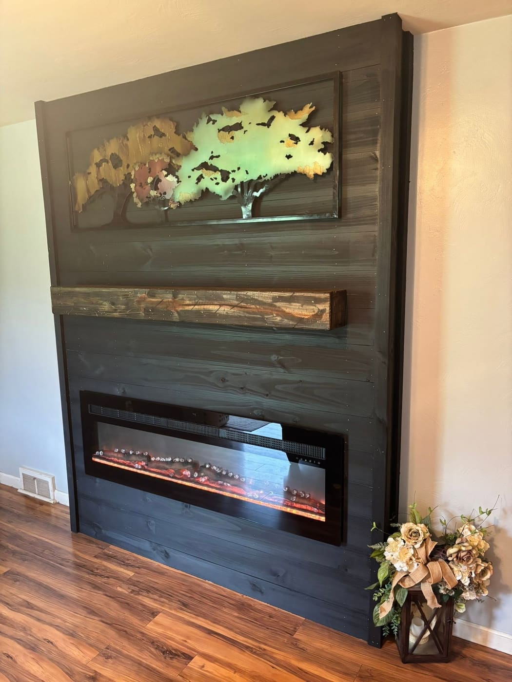 Dark plank accent wall with electric fireplace and mantel, view 6