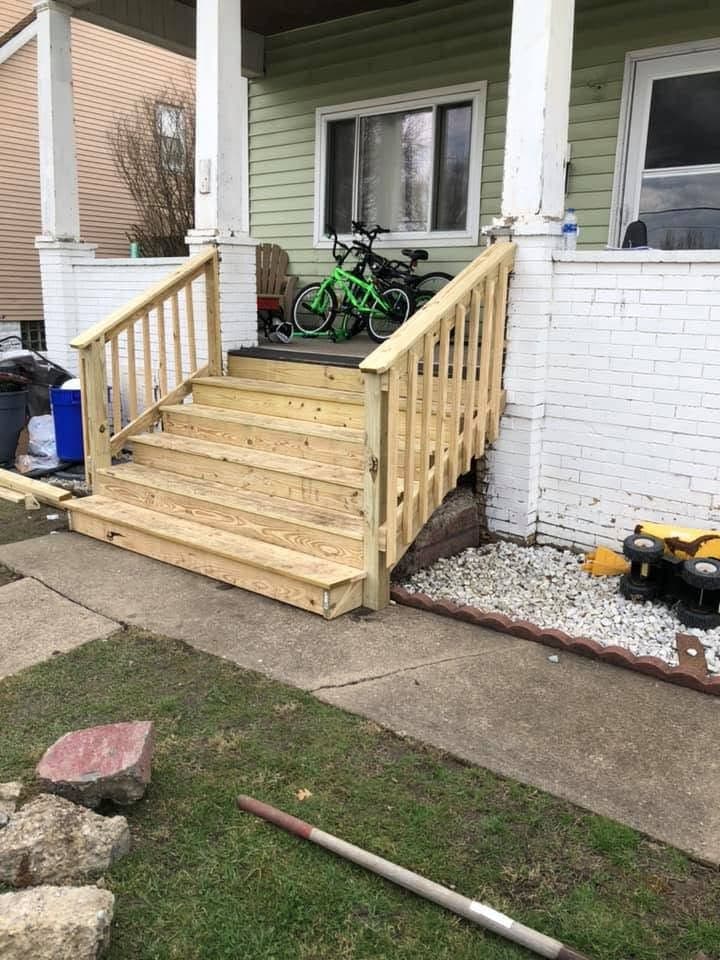 New pressure-treated front steps and railing