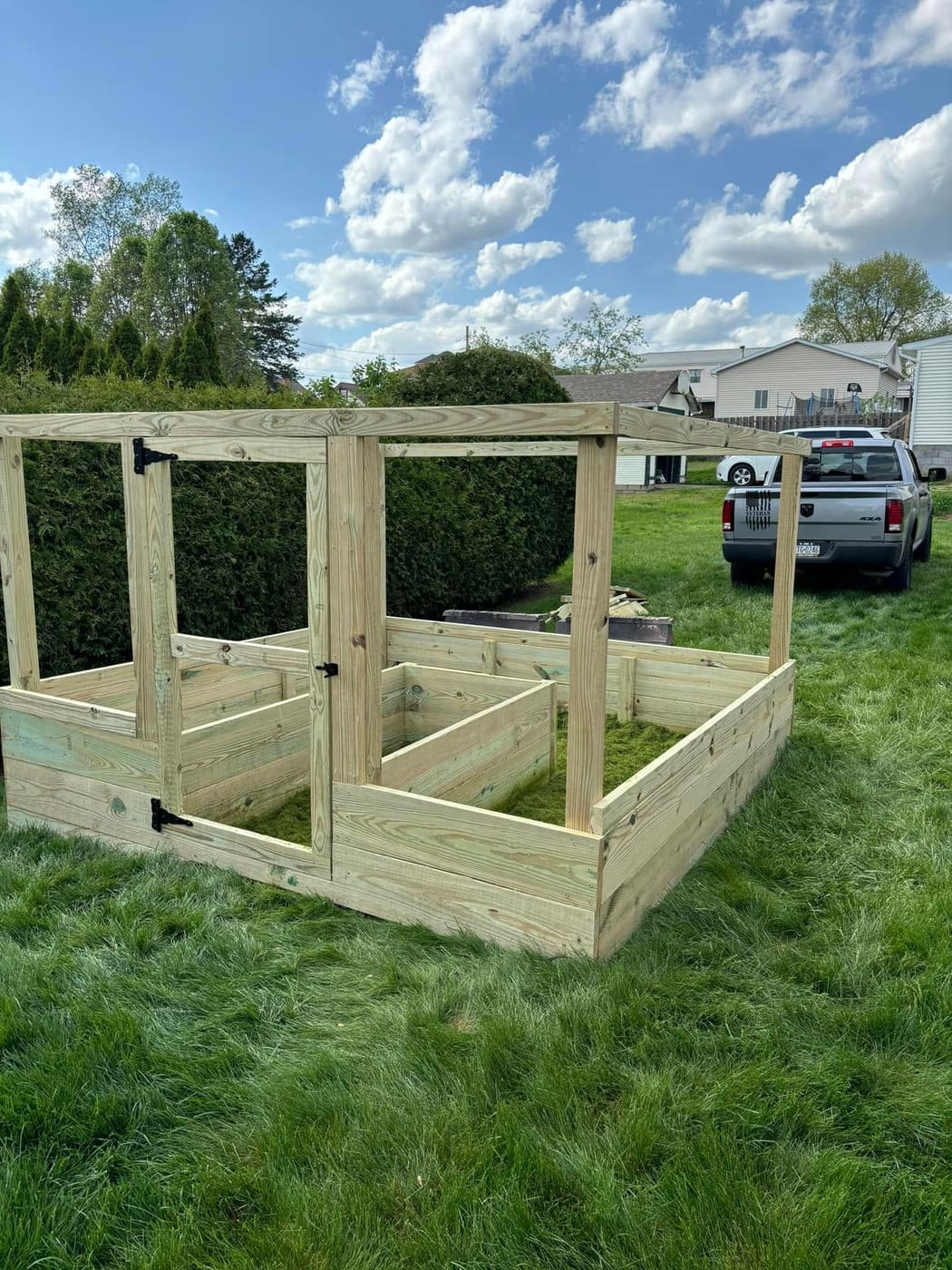 Large raised garden planter with trellis