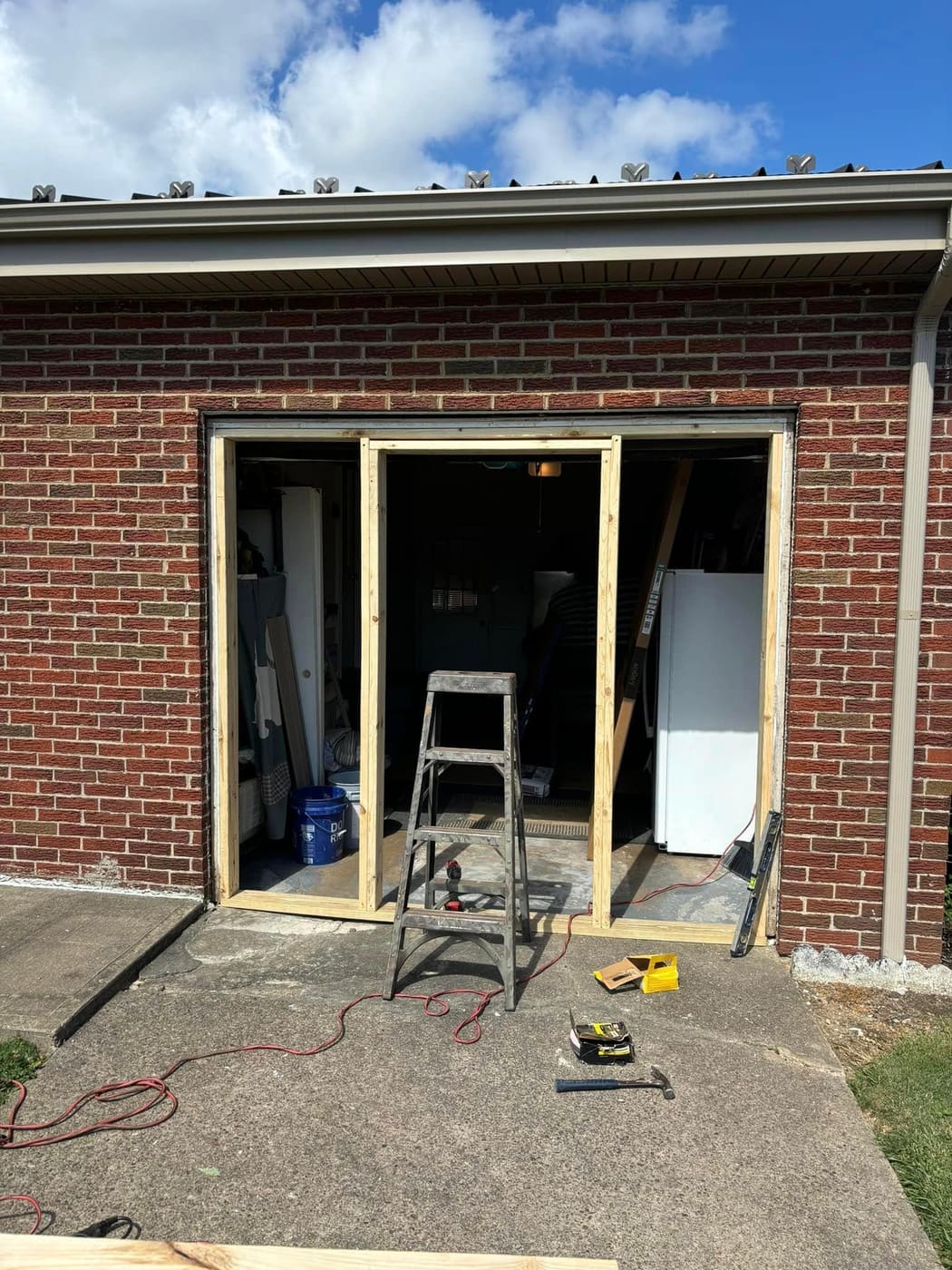 New exterior door framed into a block wall