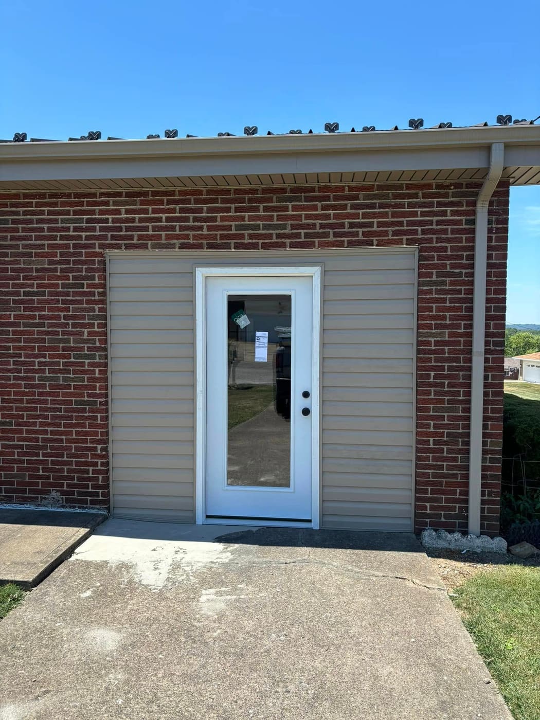 New exterior door framed into a block wall, view 3