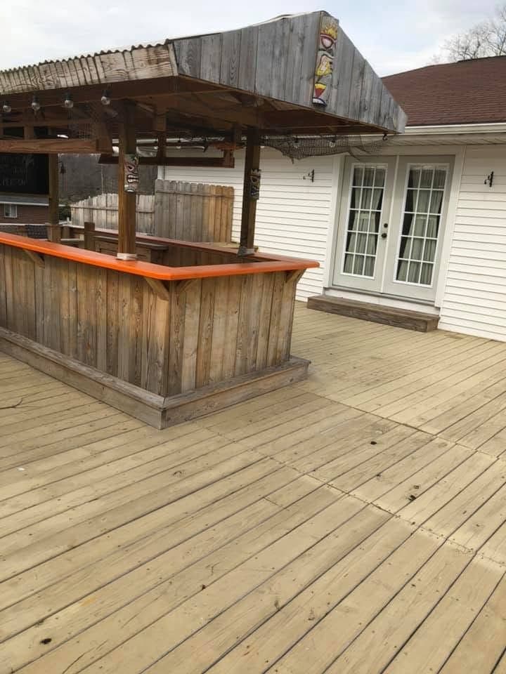 Covered outdoor bar built on a deck, view 3