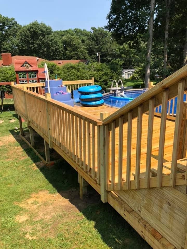 Pressure-treated deck around a pool, view 3