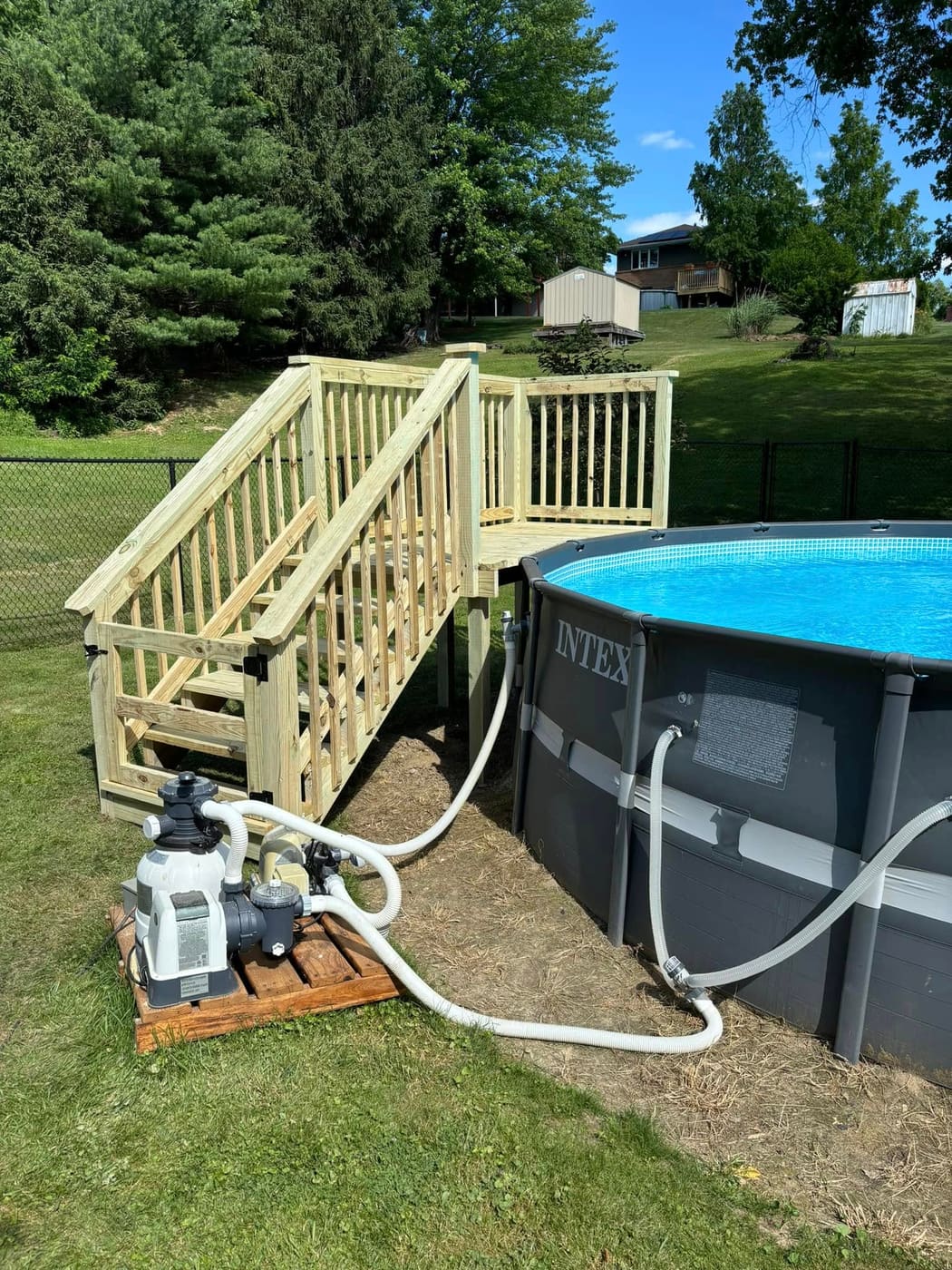 Pressure-treated stairs for an above-ground pool