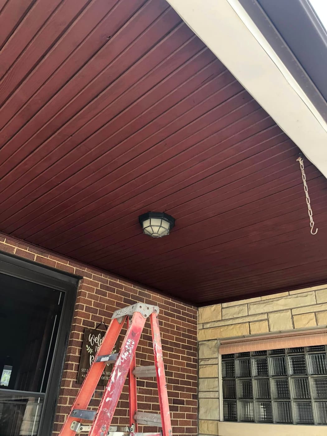 Finished porch ceiling with light fixture, view 2