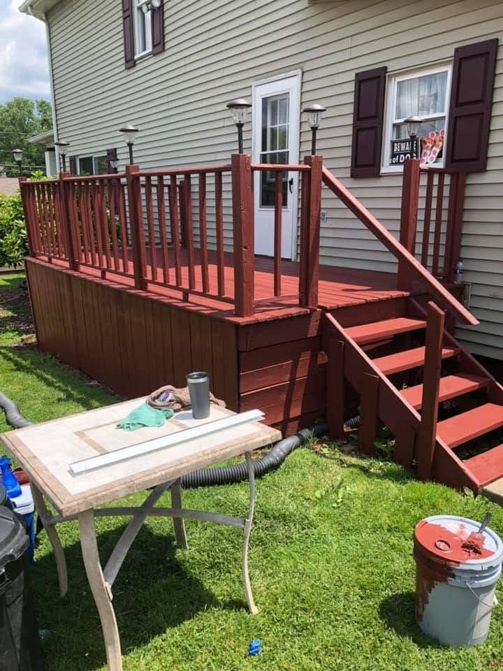 Deck and privacy fence stained red
