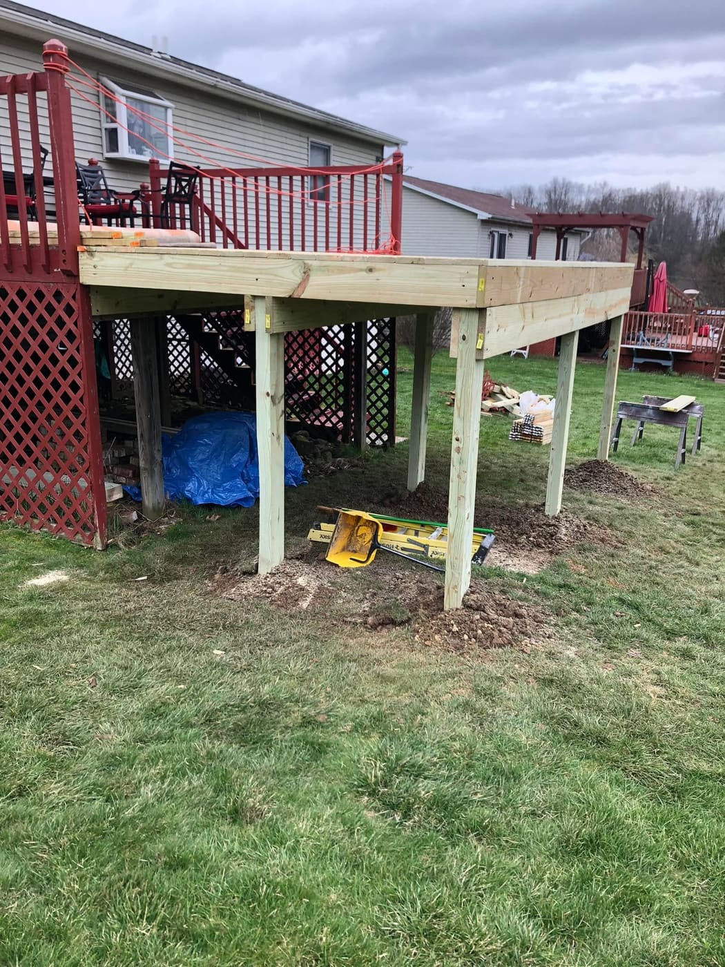 Second-story deck rebuilt on new posts