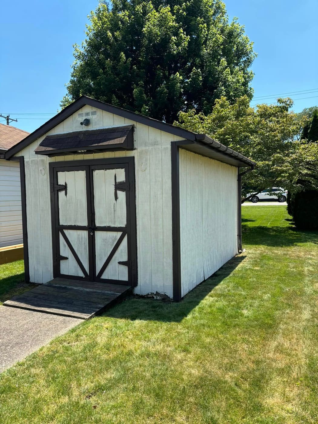 Backyard shed with new siding
