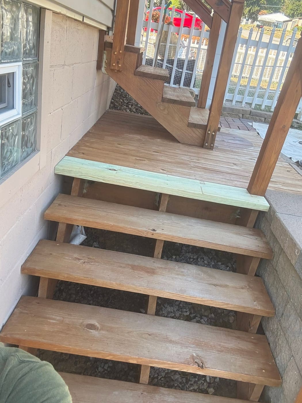 Before: Porch steps repaired and stained