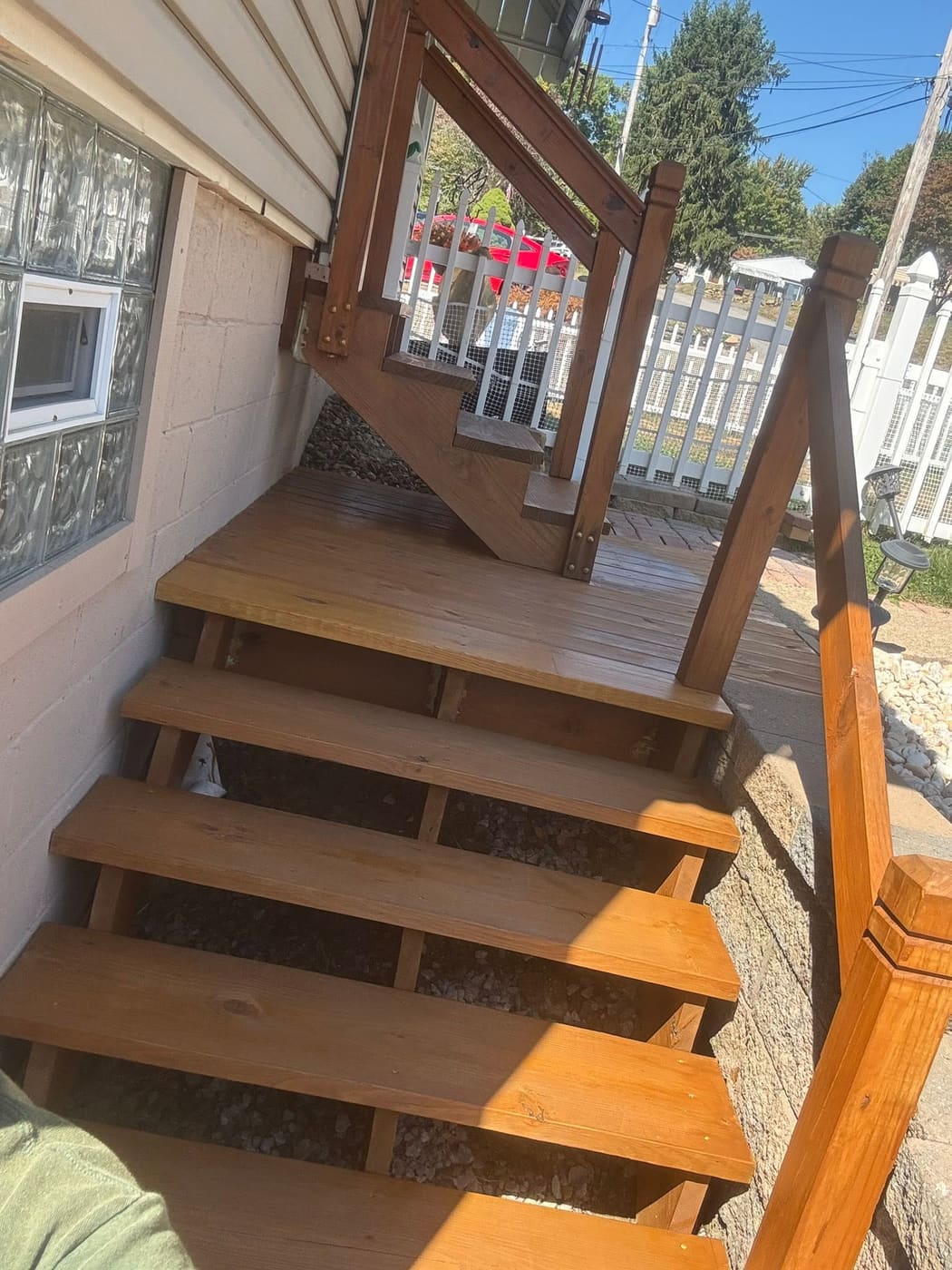 Porch steps repaired and stained, view 2